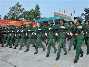 Marching for the Reunification Day (Photo: VNA)
